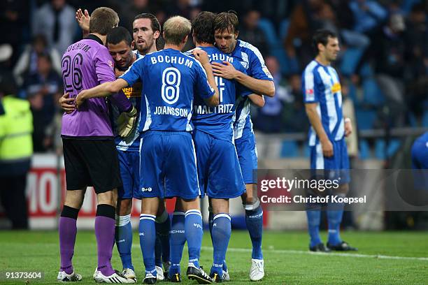 The team of Bochum with Andreas Luthe, Christian Fuchs, Andreas Johansson, Marcel Maltritz and Christoph Dabrowski celebrate the 1-1 draw after the...