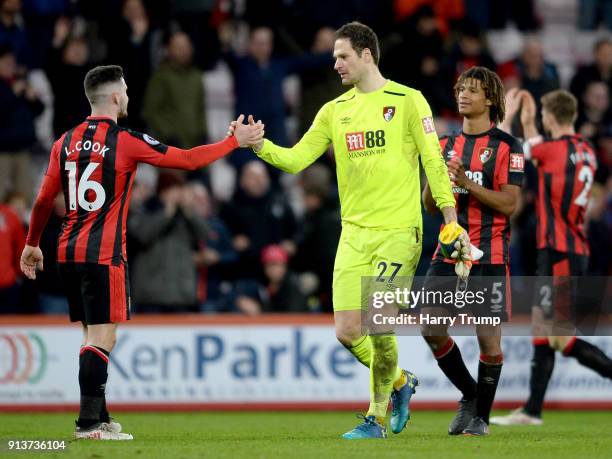 Asmir Begovic of AFC Bournemouth and Lewis Cook of AFC Bournemouth embrace after the Premier League match between AFC Bournemouth and Stoke City at...