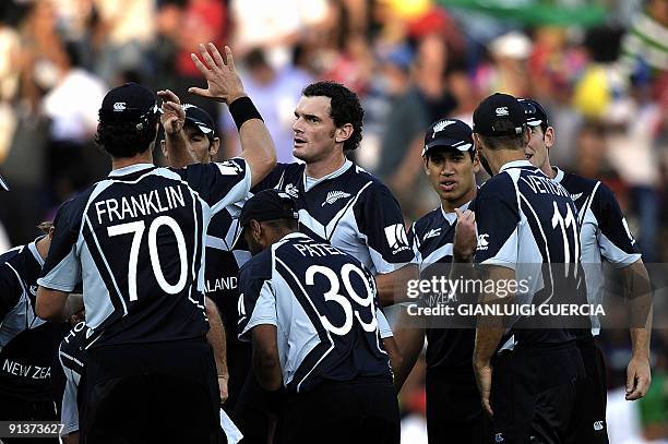 New Zealand bowler Kyle Mills celebrates after taking the wicket of Pakistan batsman Mohammad Yousuf during the ICC Champions Trophy semi final match...