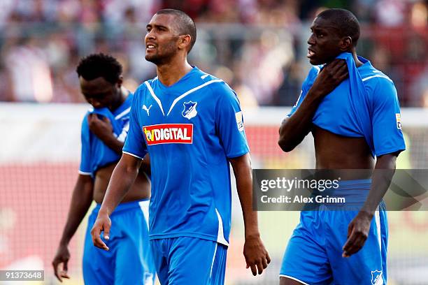 Chinedu Obasi, Marvin Compper and Demba Ba of Hoffenheim react after loosing the Bundesliga match between FSV Mainz 05 and 1899 Hoffenheim at the...