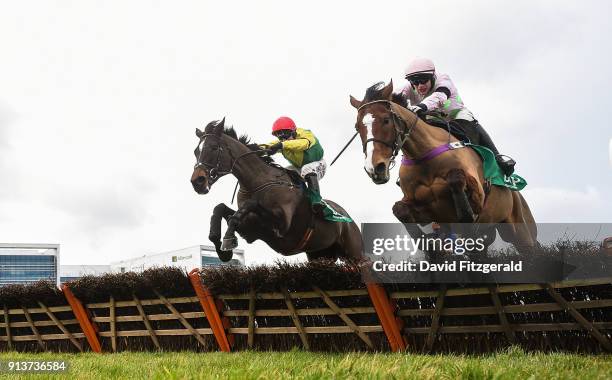 Dublin , Ireland - 3 February 2018; Supasundae, with Robbie Power up, left, jump the last ahead of Faugheen, with Paul Townend up, on their way to...
