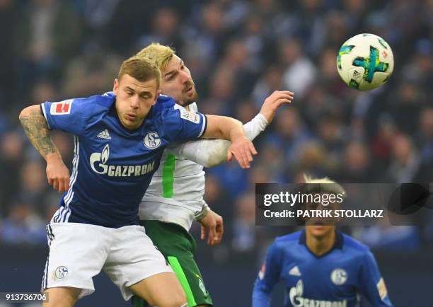 Bremen's German midfielder Jerome Gondorf and Schalke's German midfielder Max Meyer vie for the ball during the German first division Bundesliga...