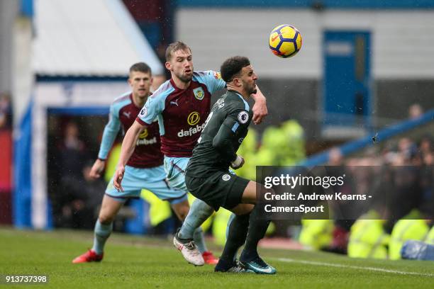 Manchester City's Kyle Walker under pressure Burnley's Charlie Taylor during the Premier League match between Burnley and Manchester City at Turf...