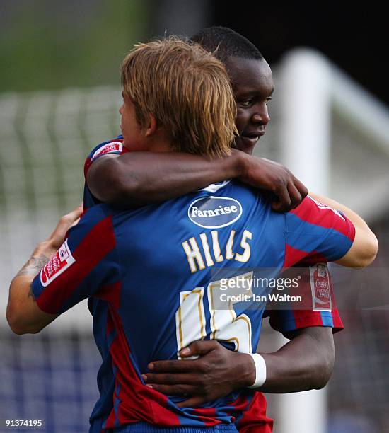 Alassane N'Diaye of Crystal Palace is congratulated by Lee Hills after scoring a goal during the Coca Cola Championship match between Crystal Palace...