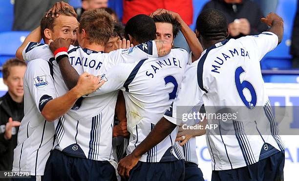 Bolton Wanderers English forward Kevin Davies celebrate with team mates after scoring the second goal during the English Premier League football...