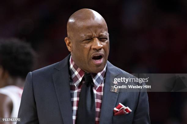 Head Coach Mike Anderson of the Arkansas Razorbacks reacts to his players during a game against the Oklahoma State Cowboys at Bud Walton Arena on...