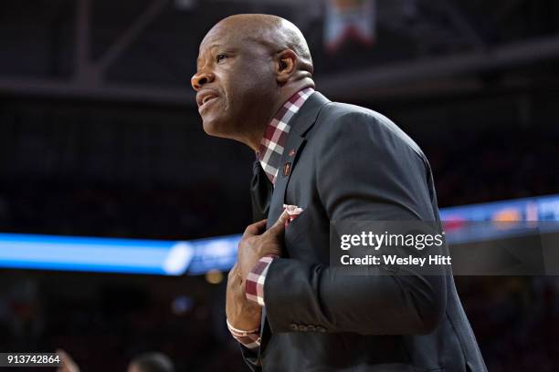 Head Coach Mike Anderson of the Arkansas Razorbacks talks to his players during a game against the Oklahoma State Cowboys at Bud Walton Arena on...