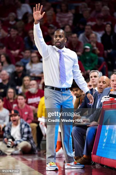Head Coach Mike Boynton Jr. Of the Oklahoma State Cowboys signals to his team during a game against the Arkansas Razorbacks at Bud Walton Arena on...