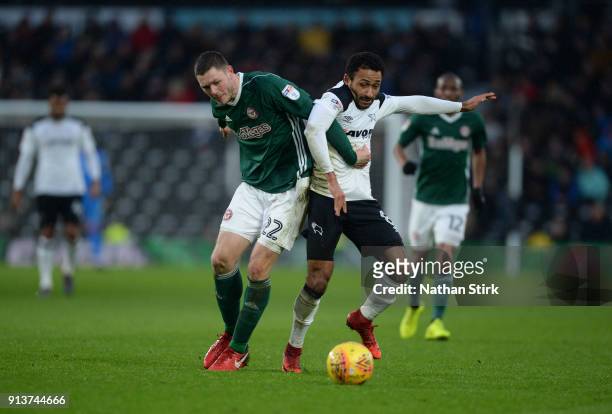 Ikechi Anya of Derby County and Henrik Dalsgaard of Brentford in action during the Sky Bet Championship match between Derby County and Brentford at...