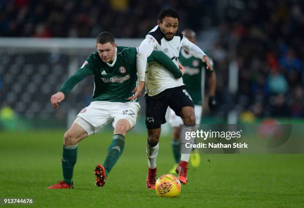 Ikechi Anya of Derby County and Henrik Dalsgaard of Brentford in action during the Sky Bet Championship match between Derby County and Brentford at...