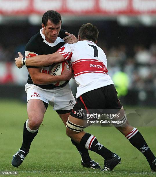 Bismarck du Plessis of the Sharks is challenged by Derek Minnie of the Lions during the Absa Currie Cup match between the Sharks and Lions from Absa...