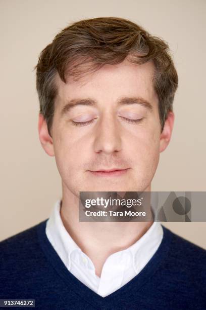 man with eyes closed - closed stock pictures, royalty-free photos & images