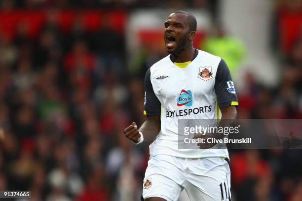 Darren Bent of Sunderland celebrates scoring the opening goal during the Barclays Premier League match between Manchester United and Sunderland at...
