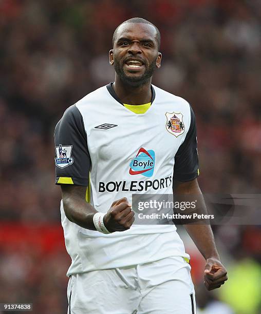 Darren Bent of Sunderland celebrates scoring their first goal during the Barclays Premier League match between Manchester United and Sunderland at...