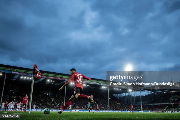General view as Christian Guenter of Freiburg takes a corner kick during the Bundesliga match between Sport-Club Freiburg and Bayer 04 Leverkusen at...