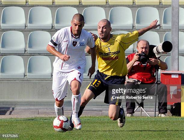 Biagio Pagano of Reggina Calcio competes with Simone Gozzi of Modena FC during the match of Serie B between Modena FC and Reggina Calcio at Alberto...