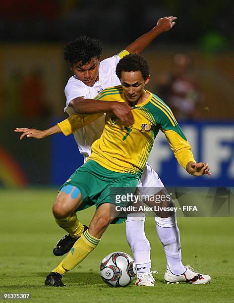 Dylon Claasen of South Africa is challenged by Mario Martinez of Honduras during the FIFA U20 World Cup Group F match between South Africa and...