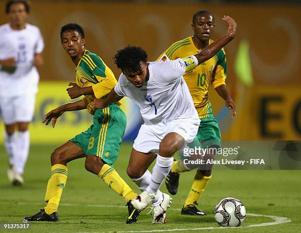 Mario Martinez of Honduras beats Sameehg Doutie of South Africa during the FIFA U20 World Cup Group F match between South Africa and Honduras at the...