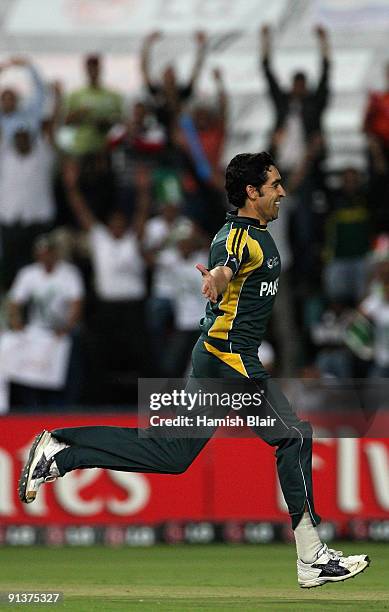 Umar Gul of Pakistan celebrates the wicket of Martin Guptill of New Zealand during the ICC Champions Trophy 2nd Semi Final match between New Zealand...