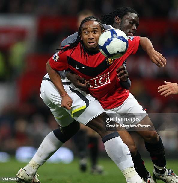 Anderson of Manchester United clashes with Kenwyne Jones of Sunderland during the Barclays Premier League match between Manchester United and...