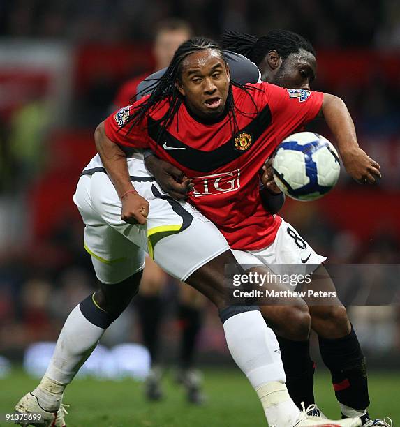 Anderson of Manchester United clashes with Kenwyne Jones of Sunderland during the Barclays Premier League match between Manchester United and...