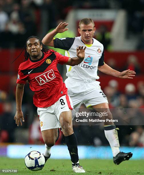 Anderson of Manchester United clashes with Lee Cattermole of Sunderland during the Barclays Premier League match between Manchester United and...