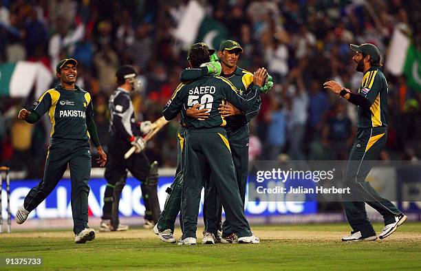 Pakistani players celebrate the dismissal of Aaron Redmond during The 2nd ICC Champions Trophy Semi Final between New Zealand and Pakistan at...