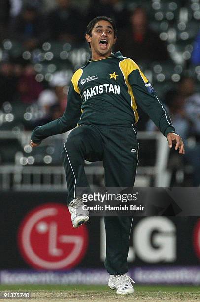 Saeed Ajmal of Pakistan celebrates the catch from his own bowling to dismiss Aaron Redmond of New Zealand during the ICC Champions Trophy 2nd Semi...