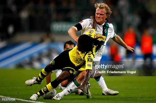 Tinga of Dortmund in action with Tobias Levels of Moenchengladbach during the Bundesliga match between Borussia Moenchengladbach and Borussia...