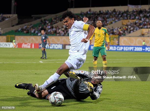 Mario Martinez of Honduras is challenged by Darren Keet of South Africa during the FIFA U20 World Cup Group F match between South Africa and Honduras...