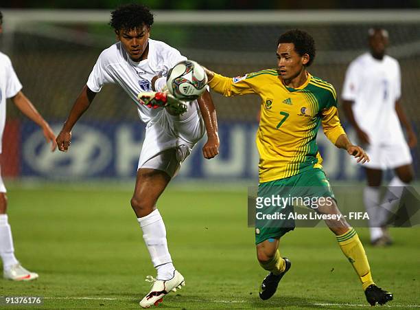 Mario Martinez of Honduras holds off a challenge from Dylon Claasen of South Africa during the FIFA U20 World Cup Group F match between South Africa...