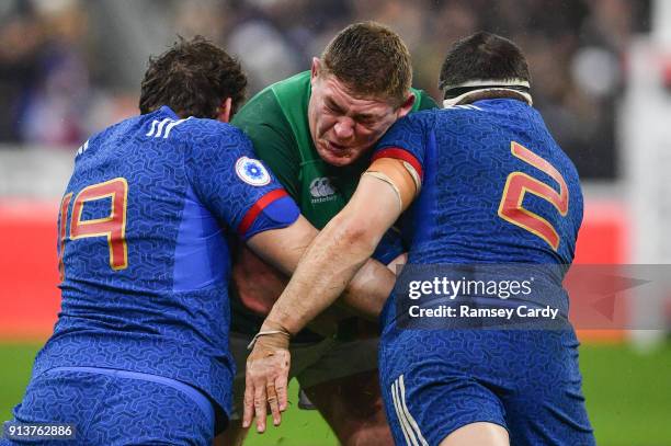 Paris , France - 3 February 2018; Tadhg Furlong of Ireland is tackled by Paul Gabrillagues, left, and Guilhem Guirado of France during the NatWest...