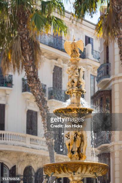 close up of the fuente de génova, a 16th century marble fountain in plaza de la constitución, malaga. - génova - fotografias e filmes do acervo