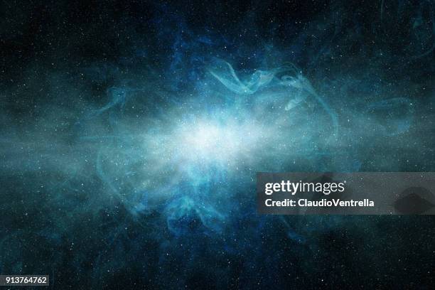 glowing light in a blue interstellar cloud