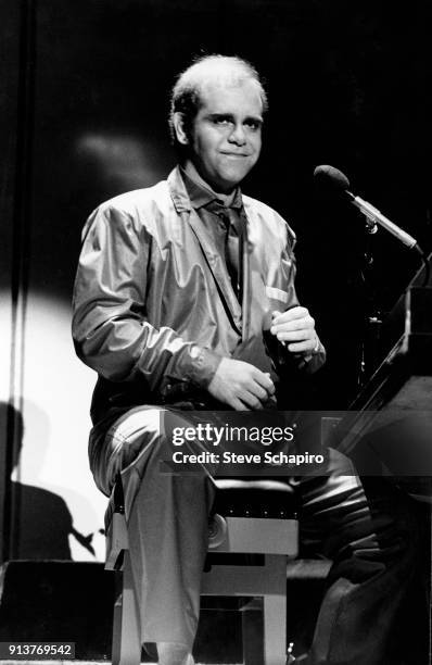 English Pop and Rock musician Elton John performs onstage at the Greek Theater, Los Angeles, California, 1979.