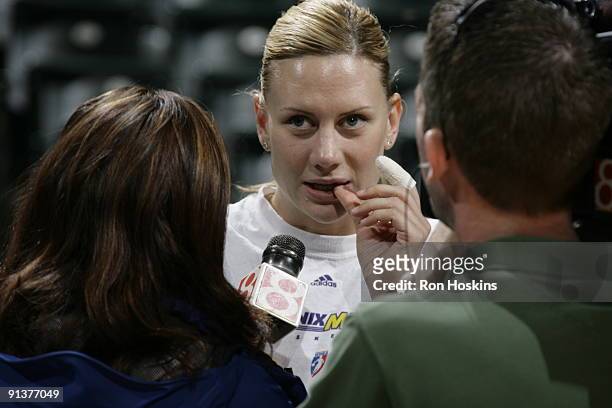 Penny Taylor of the Phoenix Suns discusses were injury during practice prior to Games Three of the WNBA Finals at Conseco Fieldhouse on October 3,...