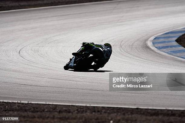 Valentino Rossi of Italy and Fiat Yamaha rounds a bend during the second free practice session ahead of the MotoGP of Portugal at the Estoril Circuit...