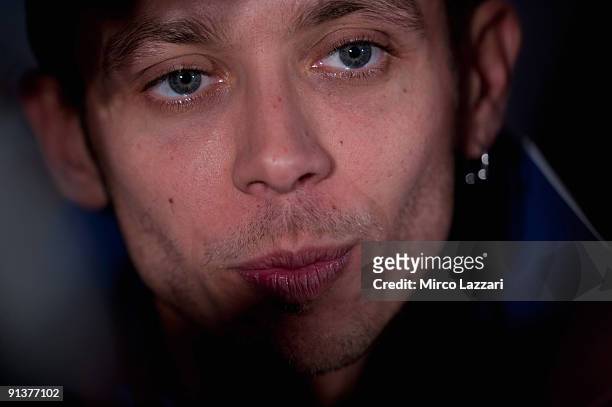 Valentino Rossi of Italy and Fiat Yamaha Team speaks during the press conference after the qualifying practice session ahead of the MotoGP of...