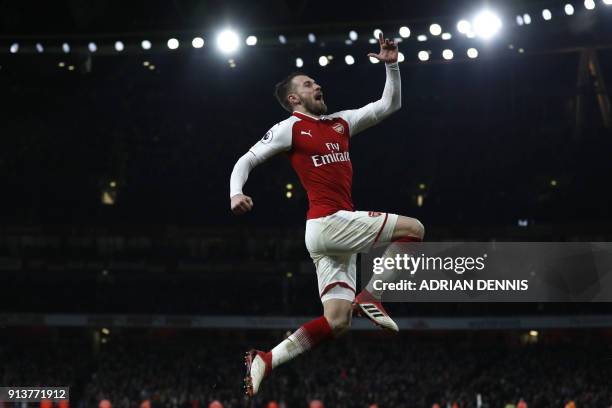 Arsenal's Welsh midfielder Aaron Ramsey celebrates scoring the team's fifth goal during the English Premier League football match between Arsenal and...
