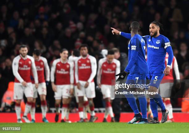 Ashley Williams of Everton and Yannick Bolasie argue after Arsenal score there fifth goal during the Premier League match between Arsenal and Everton...