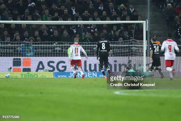 Ademola Lookman of Leipzig scores a goal to make it 0: 1 past goalkeeper Tobias Sippel of Moenchengladbach during the Bundesliga match between...