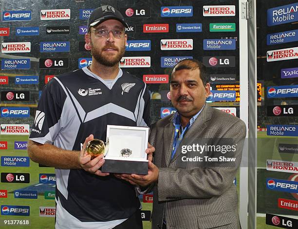 Daniel Vettori of New Zealand gets his man of the match award during the ICC Champions Trophy 2nd Semi Final match between New Zealand and Pakistan...