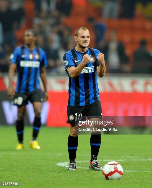 Wesley Sneijder of FC Inter celebrates scoring the second goal during the Serie A match between FC Internazionale Milano and Udinese Calcio at Stadio...