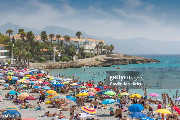 the seafront in nerja, a popular coastal resort town in andalusia. - andalucia beach stock pictures, royalty-free photos & images