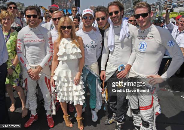 Kylie Minogue poses with Formula E racing drivers Jerome D'Ambrosio, Felix Rosenqvist, Antonio Felix da Costa, Jean-Eric Vergne and Maro Engel at the...