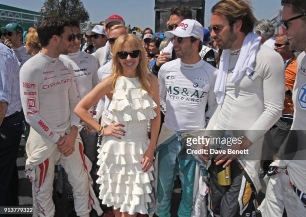 Kylie Minogue poses with Formula E racing drivers Jerome D'Ambrosio, Felix Rosenqvist, Antonio Felix da Costa, Jean-Eric Vergne and Maro Engel at the...