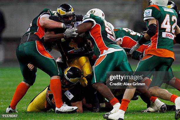 David McCants of Berlin is tackled during the American Football final German Bowl XXXI between Berlin Adler and Kiel Baltic Hurricanes at the...