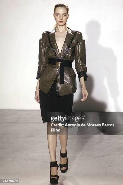 Model walks the runway during the Veronique Leroy Pret a Porter show as part of the Paris Womenswear Fashion Week Spring/Summer 2010 at Espace...