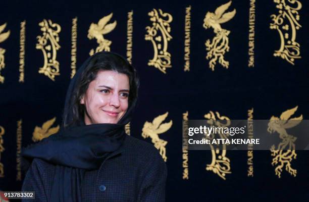 Iranian actress and director Leila Hatami poses for a photo as she arrives for a film screening during the 36th edition of the Fajr Film Festival at...