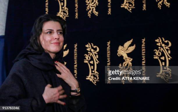 Iranian actress and director Leila Hatami poses for a photo as she arrives for a film screening during the 36th edition of the Fajr Film Festival at...